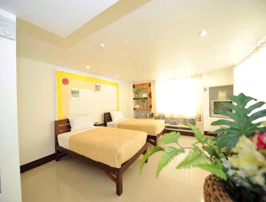 Win Hotel Phayao Oda fotoğraf